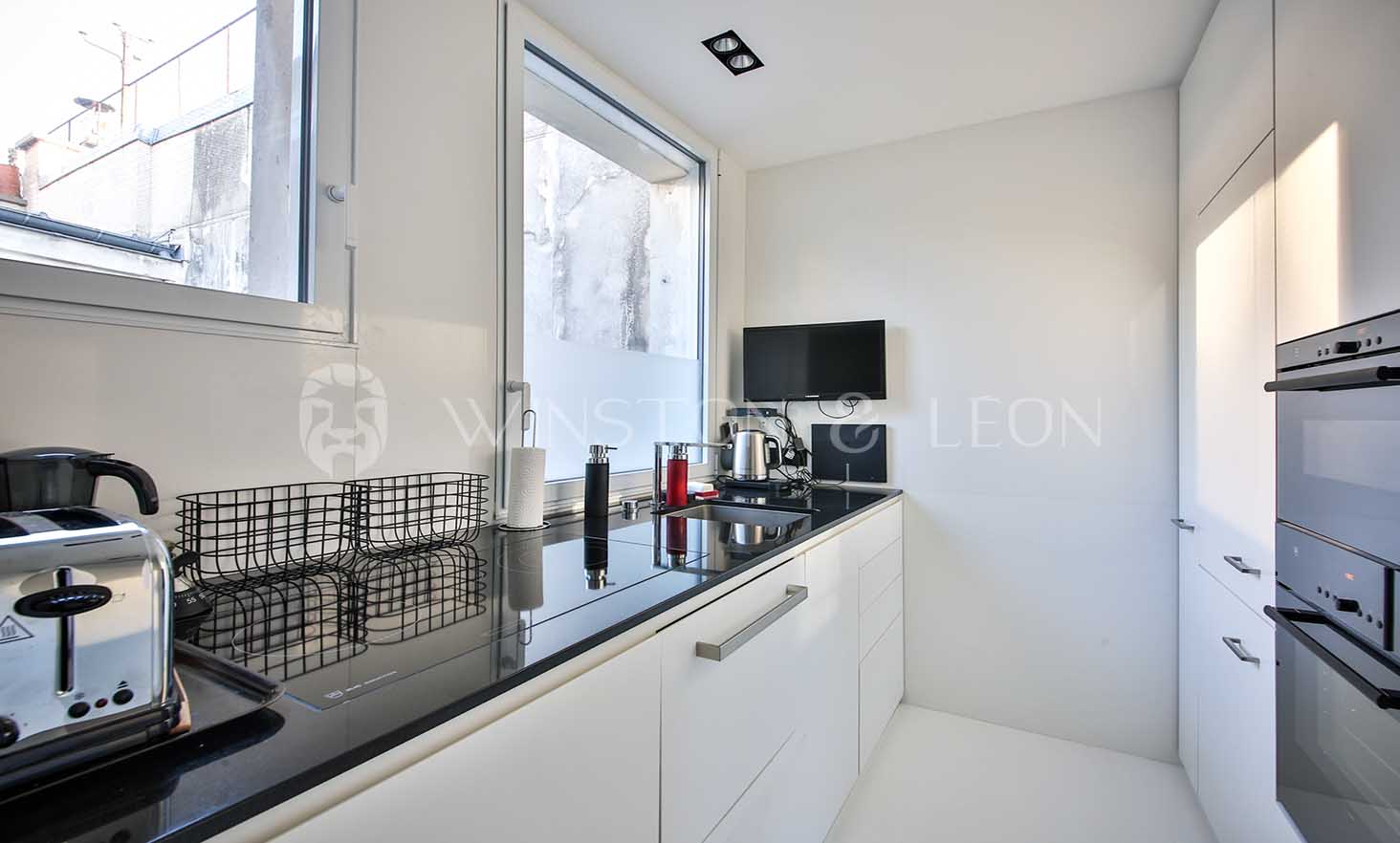 cuisine-moderne-paris-le-marais-1-chambre.jpg Cuisine moderne dans un appartement de luxe de 60 m² avec 1 chambre, Paris Le Marais.